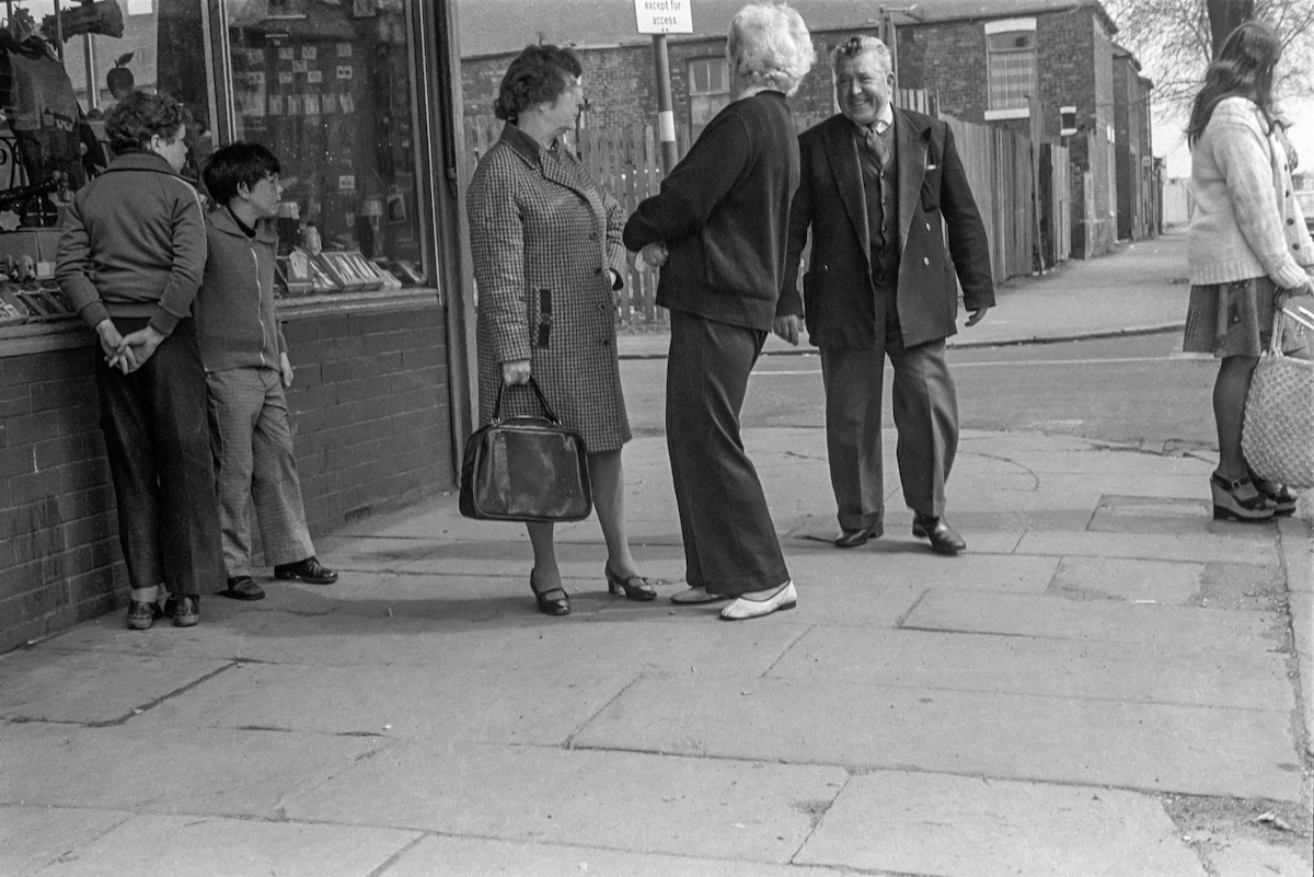 Group on pavement, Sculcoates Lane, Hull, 1979