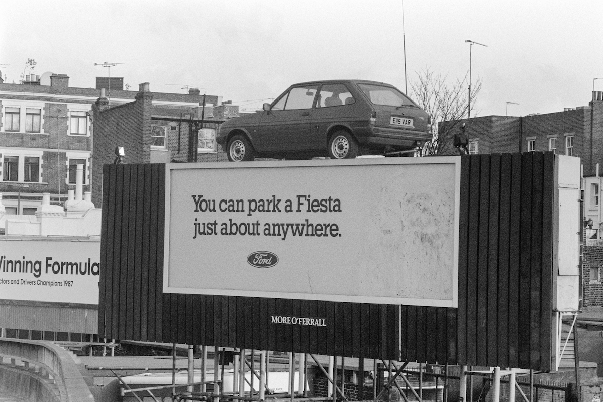 Hoarding, car, West Cromwell Rd, Kensington, Kensington & Chelsea, 1987
