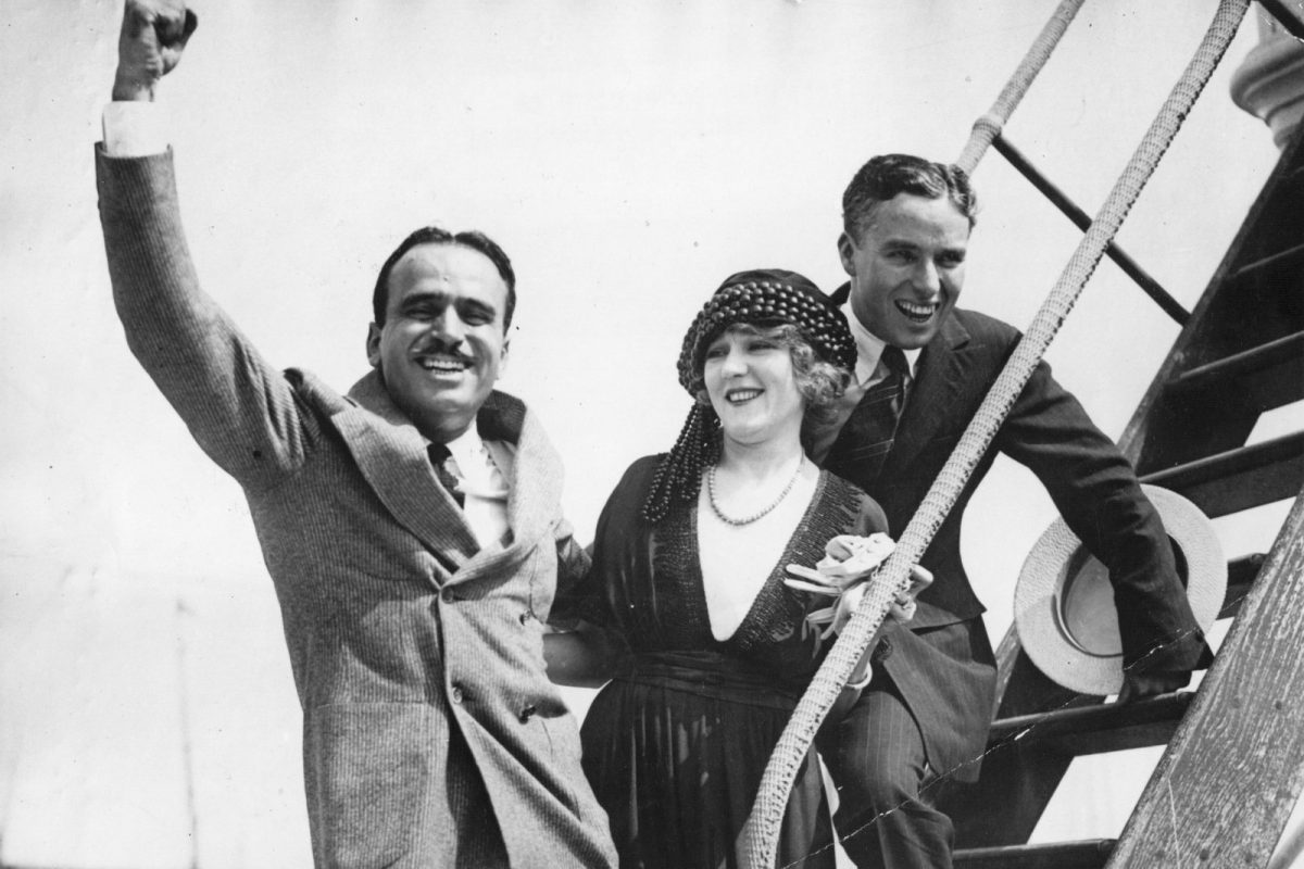 Pickford (center) created United Artists with Douglas Fairbanks (left), Charlie Chaplin (right) and D.W. Griffith (not pictured).