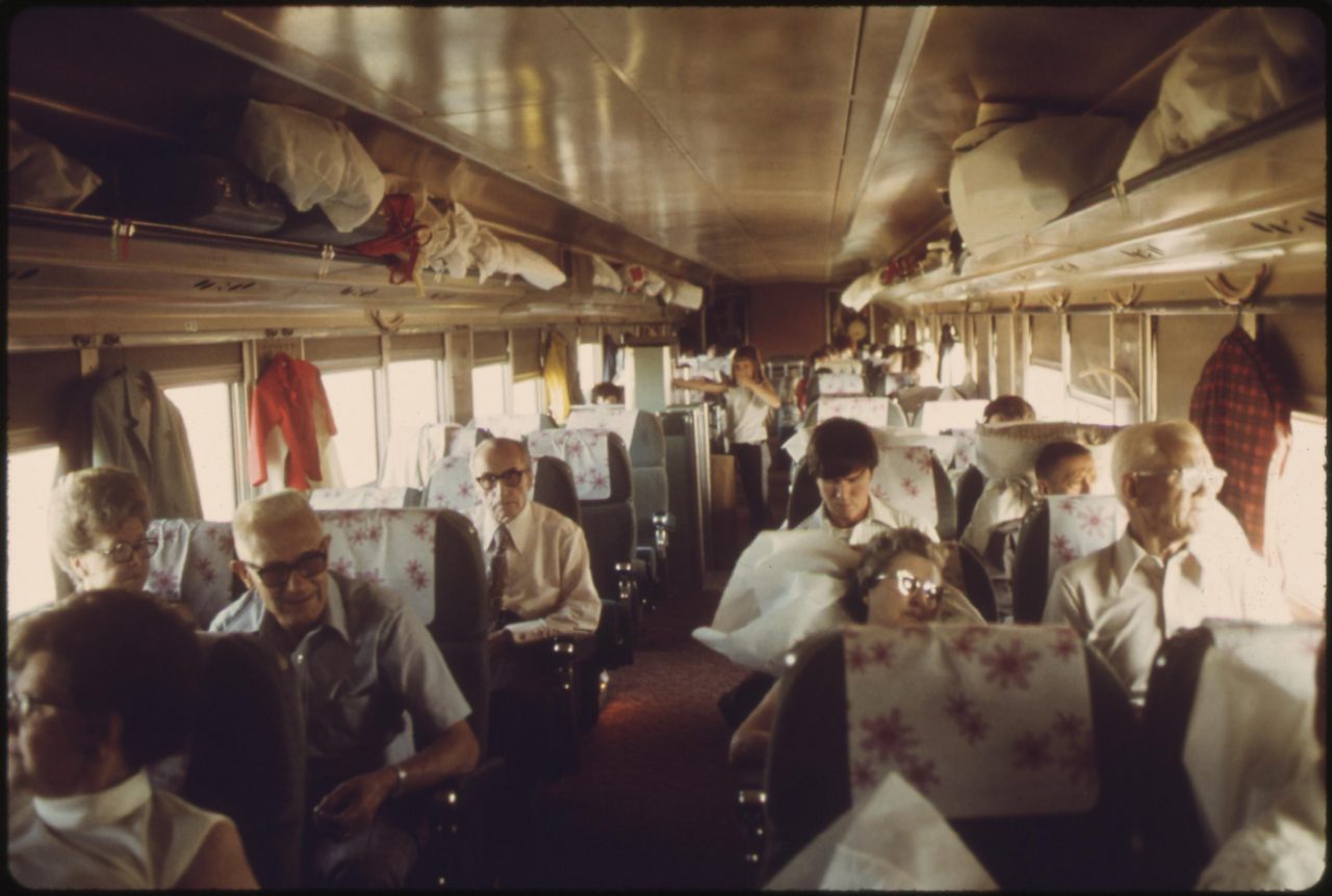 Passenger chair car on the Southwest Limited, an Amtrak train enroute from Los Angeles, California, through Albuquerque New Mexico, to Chicago, June 1974