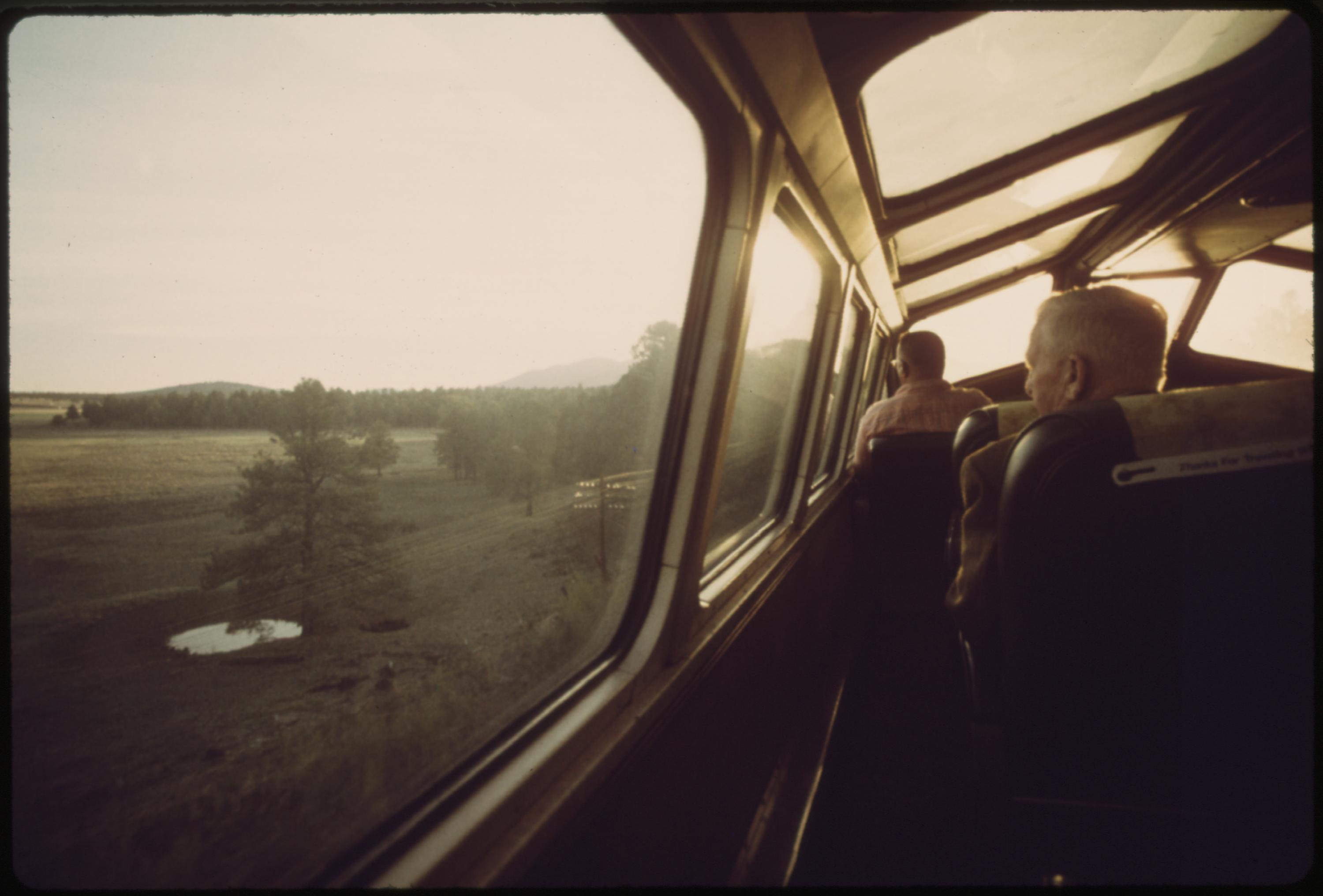 The Southwest Limited's dome car attracts passengers interested in looking at the early morning Arizona landscape, June 1974