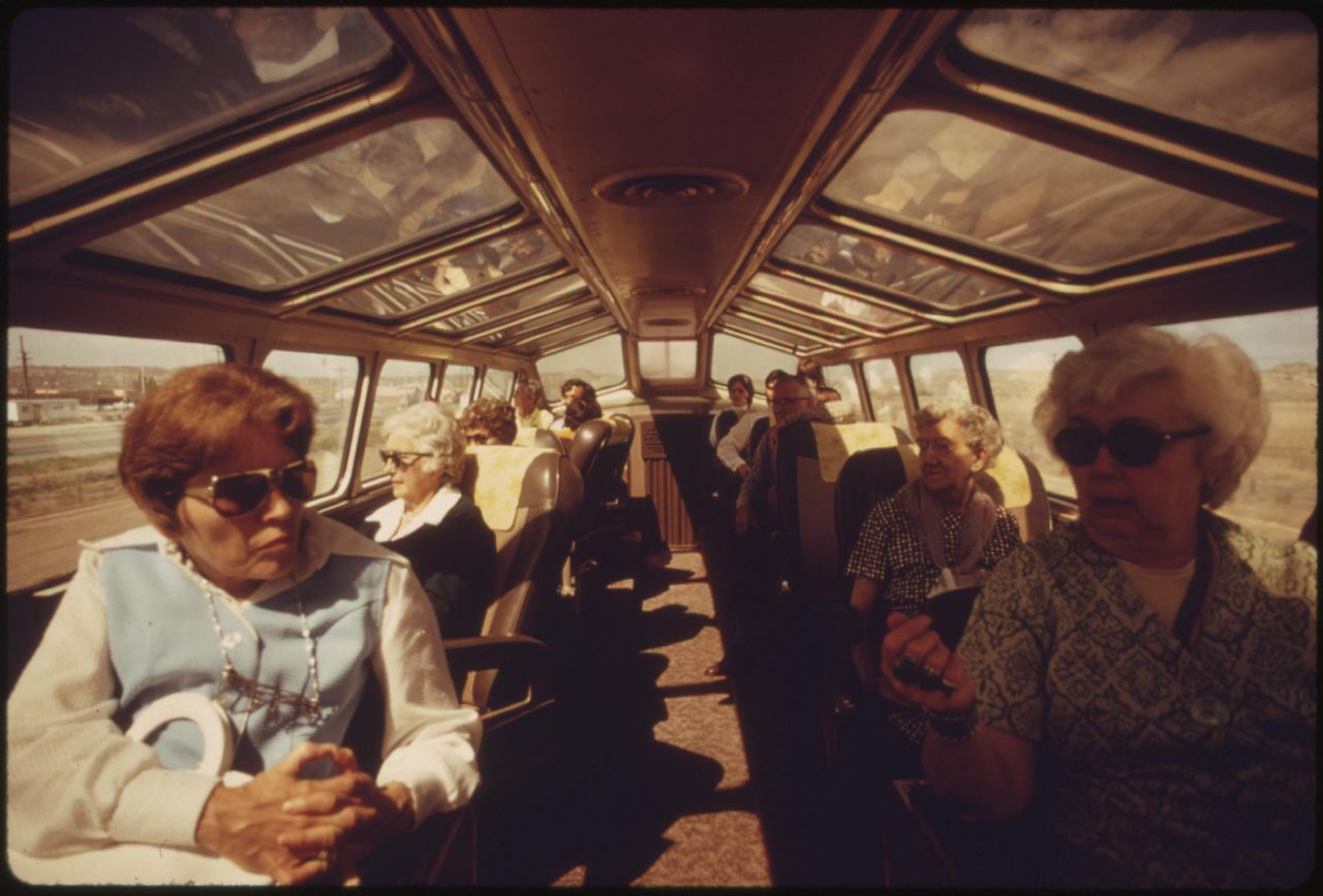 The dome car on Amtrak trains is a popular place for passengers who want to watch the scenery unfold, June 1974