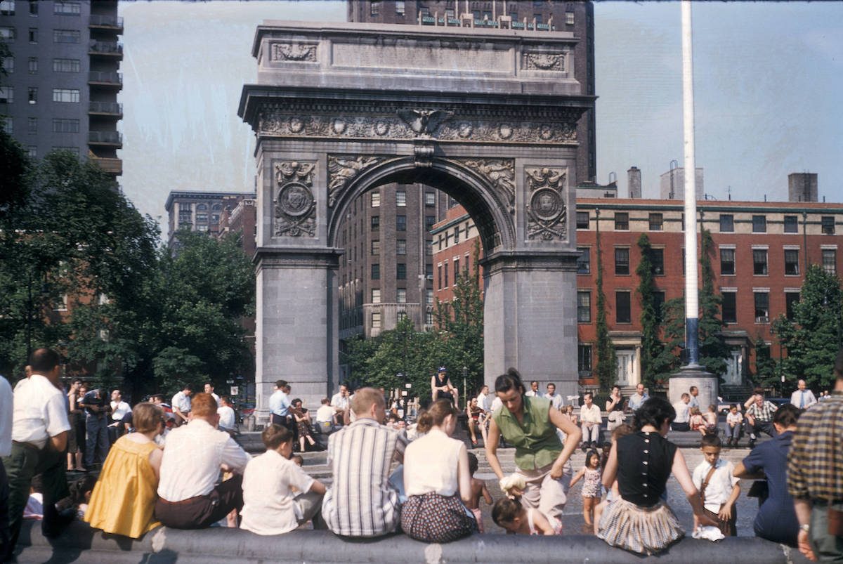 n, people gathered beneath Washington Square Park Arch 56