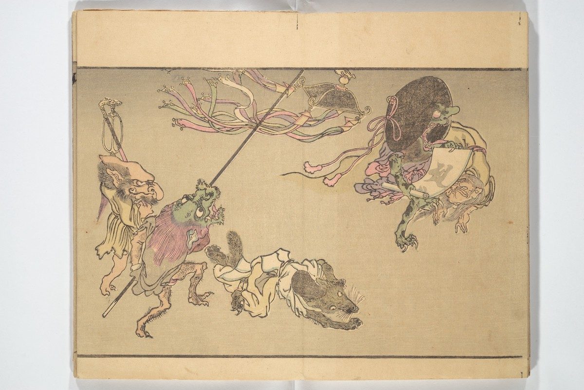 Monsters, including a badger wearing a courtier’s cap, carry Buddhist ritual implements, such as a magical scroll inscribed in Sanskrit, at far right.