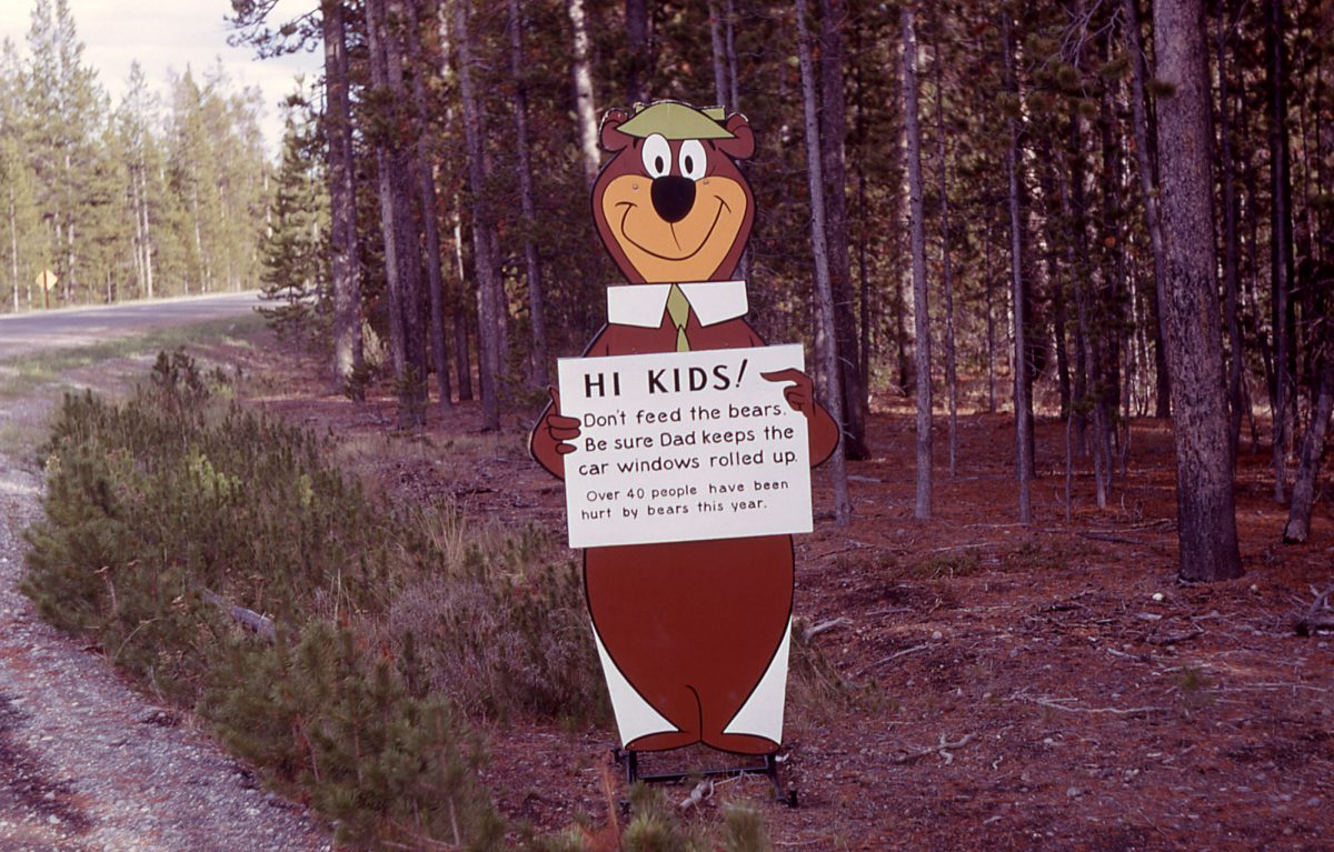 Yogi Bear Don't feed the bears sign at the west entrance to Yellowstone; William S Keller; 1961