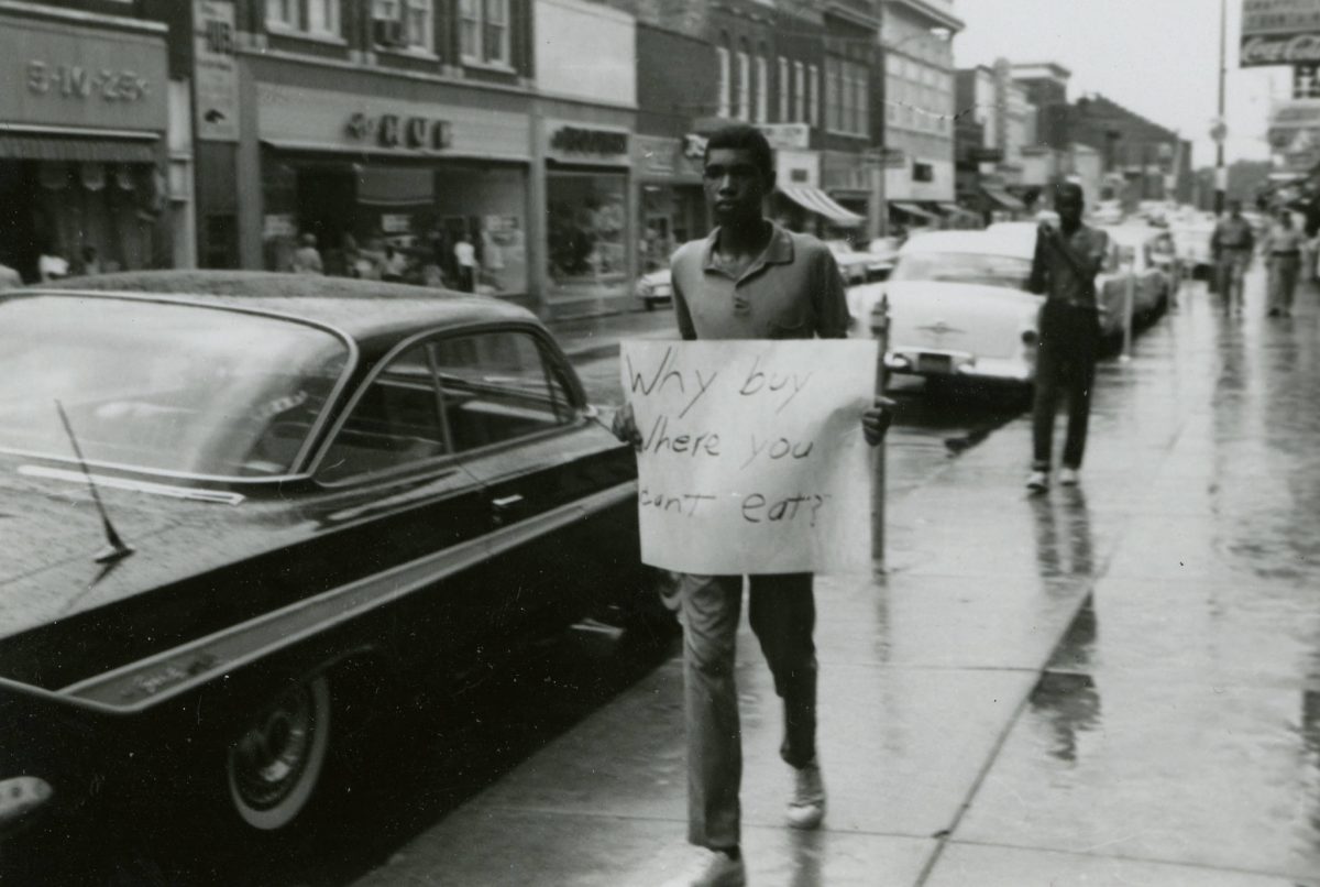 Why buy where you can't eat? Student protesters on Main Street, Farmville, Va., July 1963