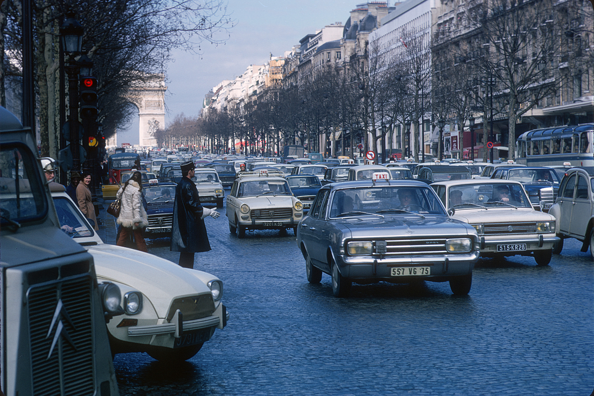 March 1970 Champs Elysees, Paris showing the Arc de Triomphe in the ...
