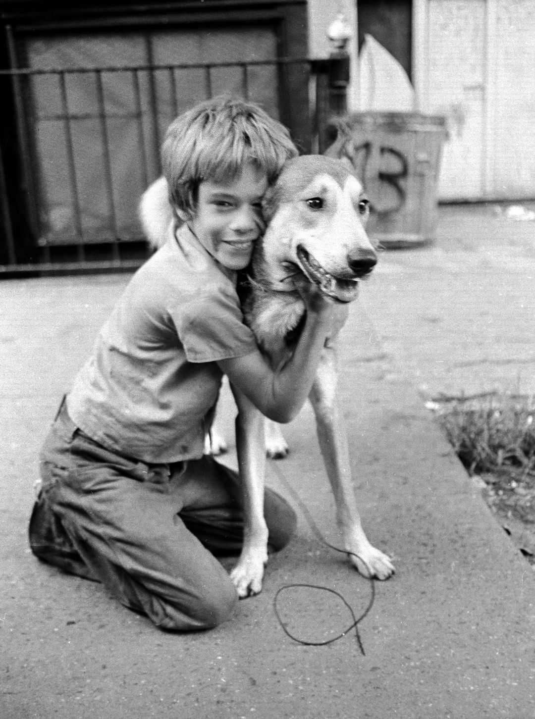Fernando Finds His First Dog E 3rd ST 1974 - © Rich Allen