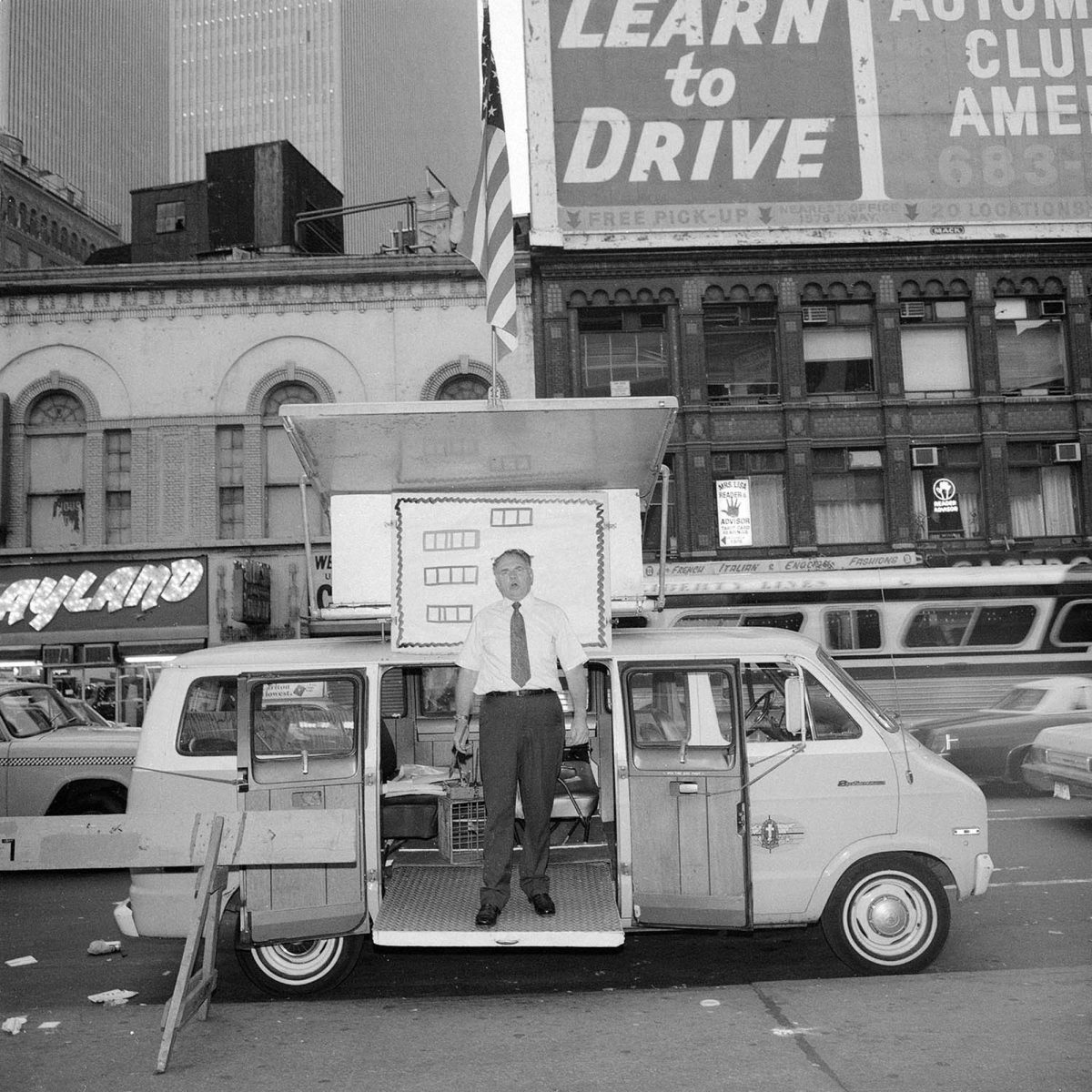 “Man in Van” (1978). Times Square, New York, New York