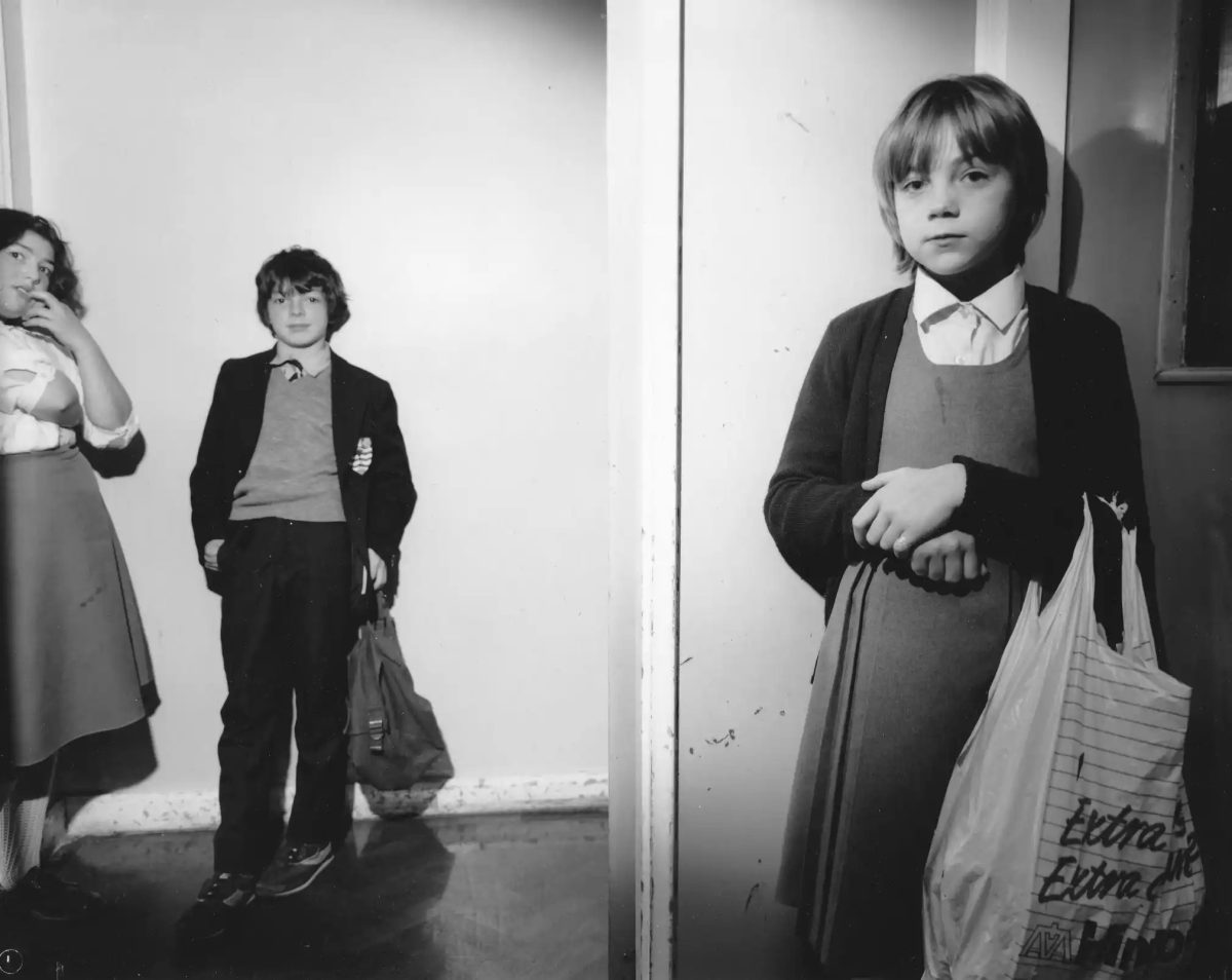 Pupils await going into lessons, morning break, East Cleveland, 1983