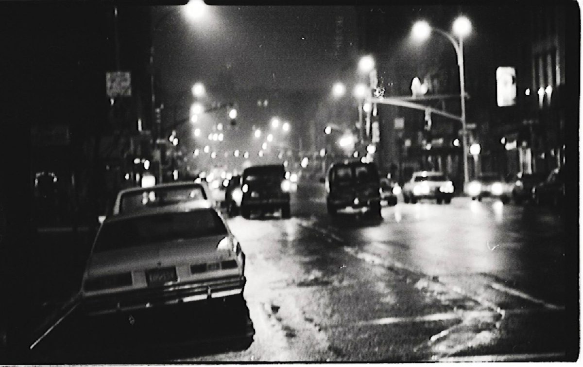 Rainy New Year's Eve. East Village. 1980s. Photo © John Fensten.