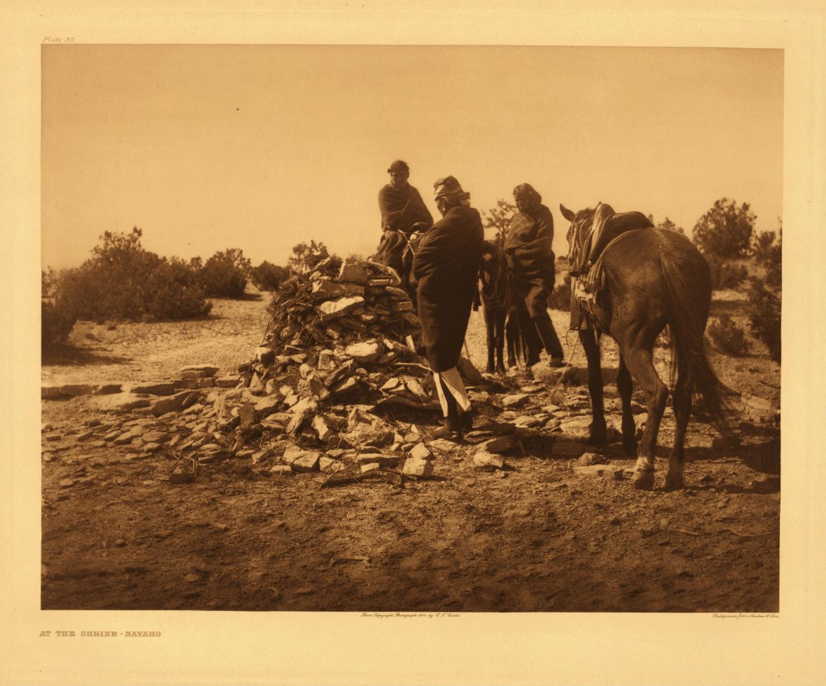 Scattered about the Navaho reservation are many cairn shrines. The Navaho, when alone or in parties, on approaching one of these gathers a few twigs of piñon or cedar, places them on the shrine, scatters a pinch of sacred meal upon it, and makes supplication for that which he may habitually need or which the moment demands.