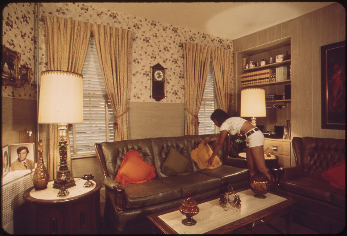 Sandra Bruno Straightens a Pillow in the Immaculate Living Room of Her Family's Home at 39 Neptune Road 07/1973