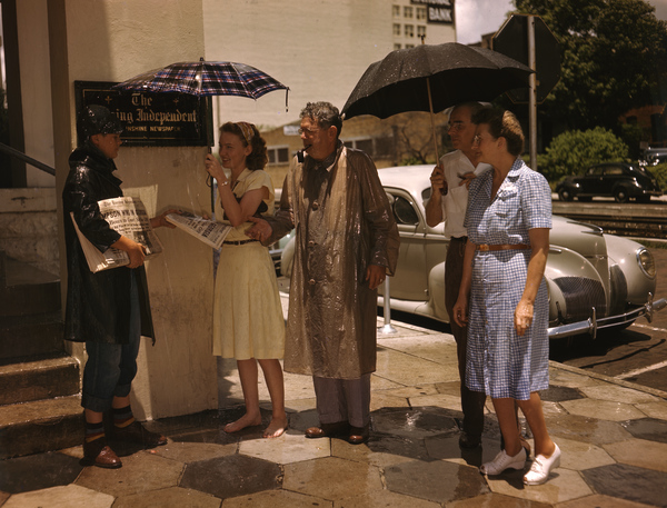  Handing out copies of The Evening Independent: St. Petersburg, Florida 

Date: March 19, 1947

 