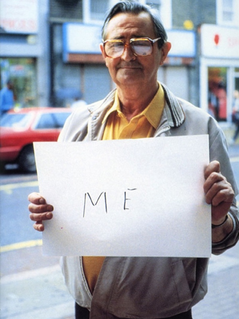 people holding signs