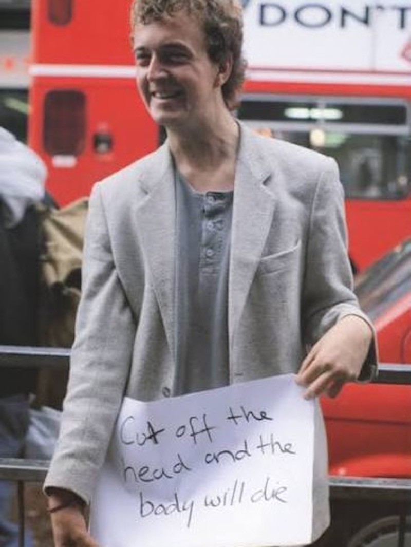 people holding signs