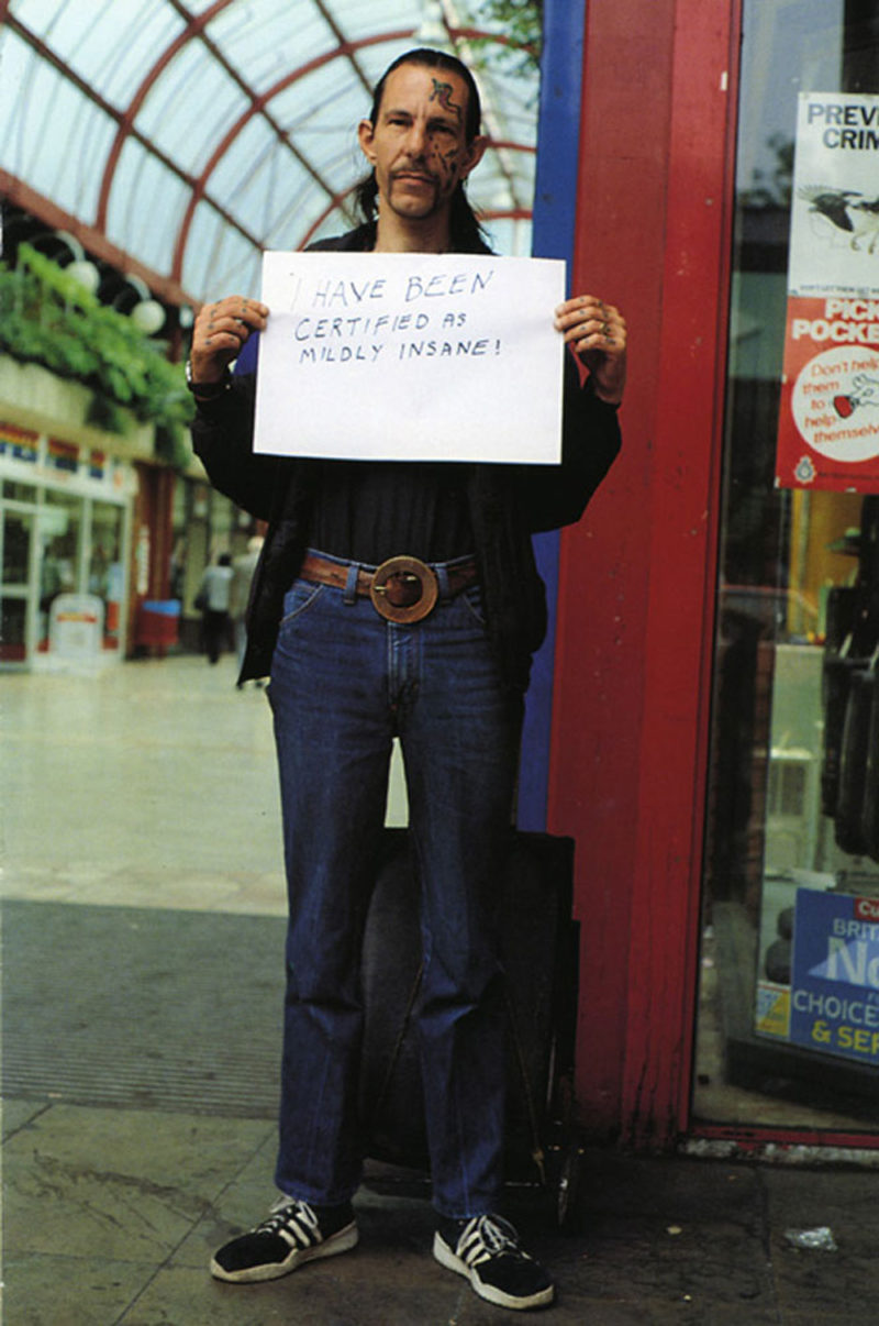 people holding signs