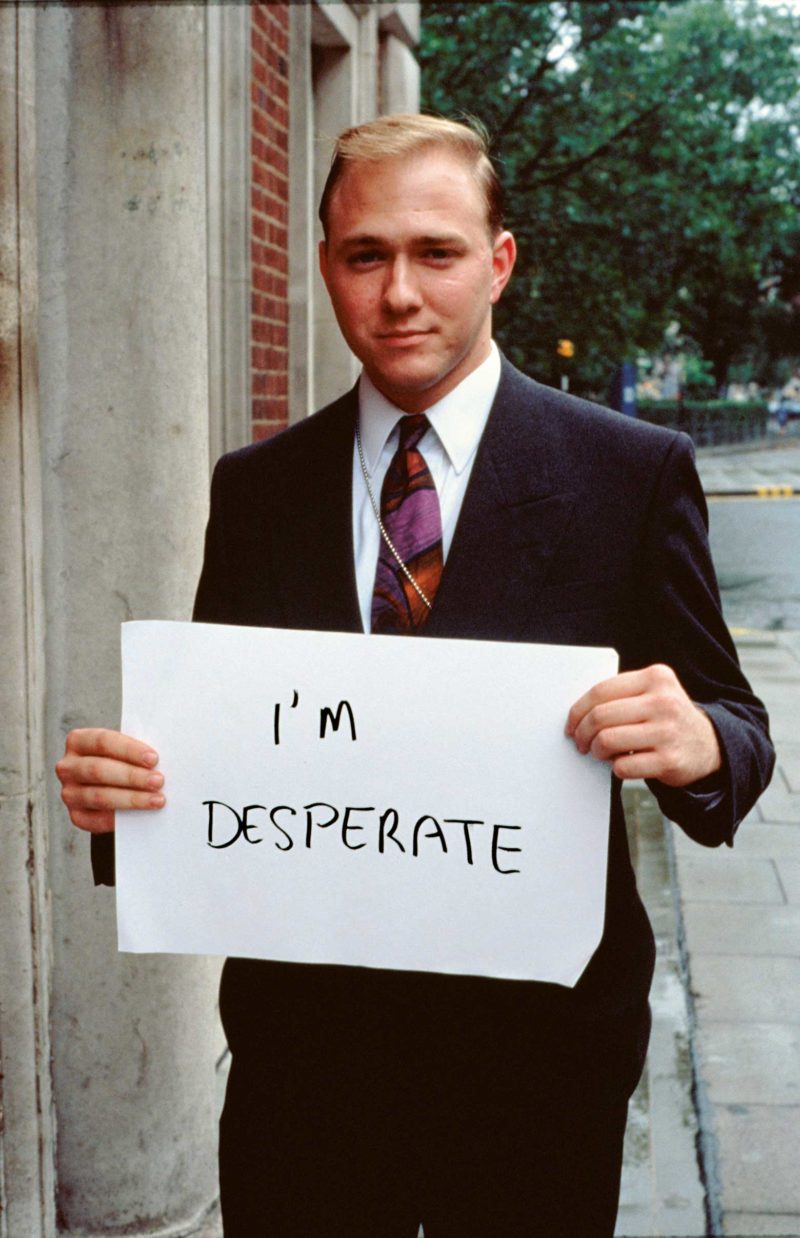 people holding signs