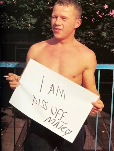 people holding signs