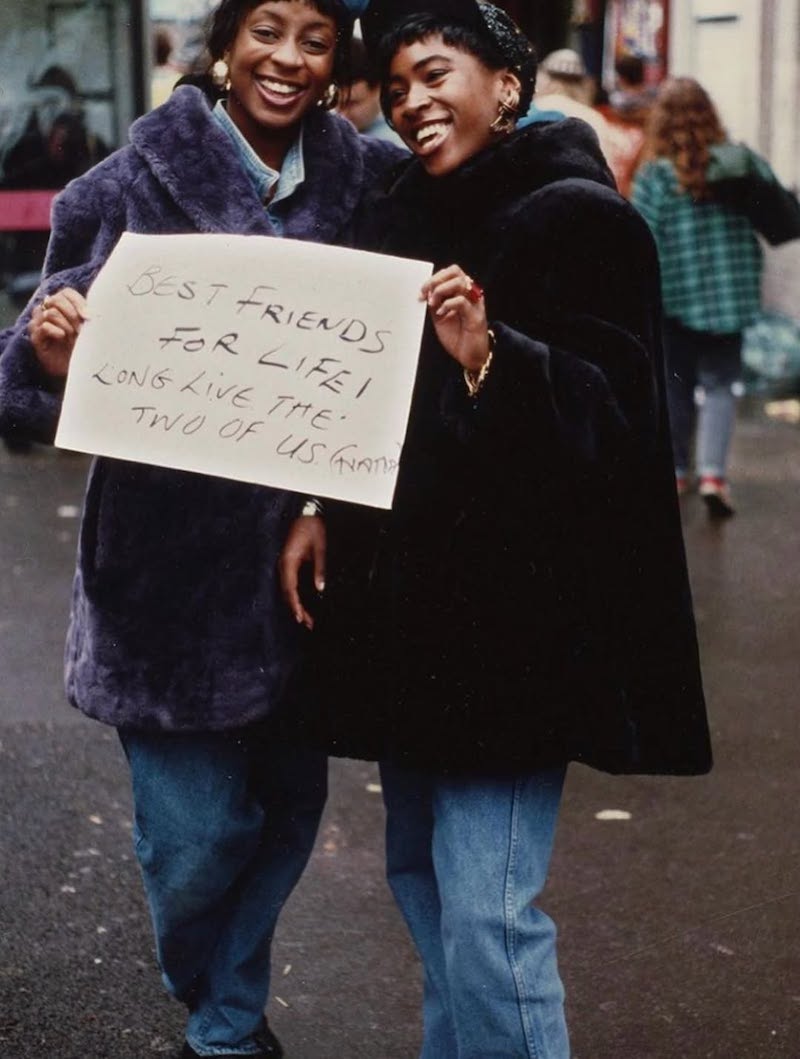 people holding signs