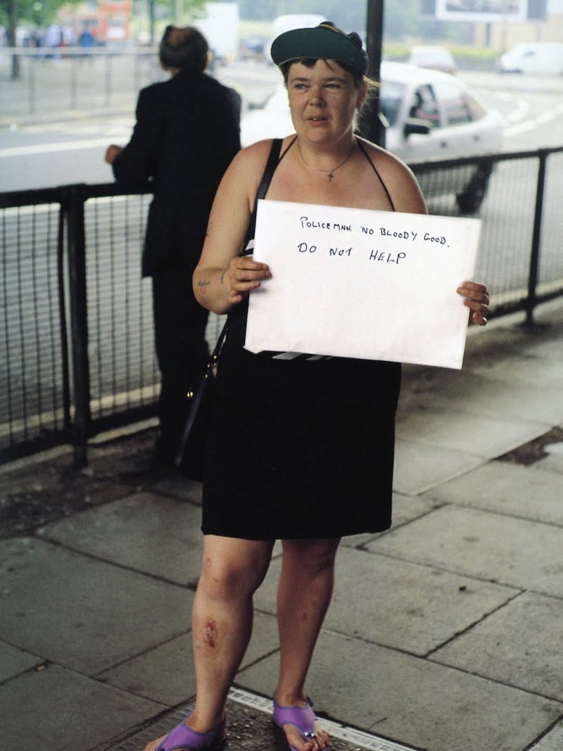 people holding signs