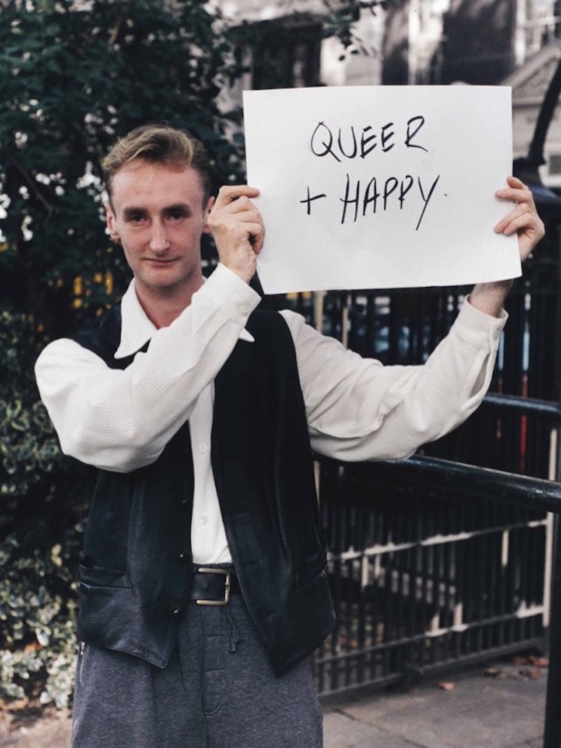 people holding signs