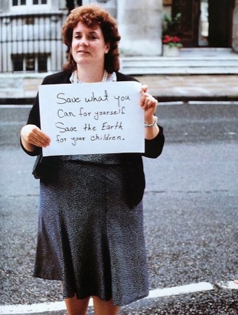 people holding signs