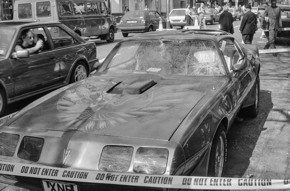 Smashed car, Charing Cross Rd, Westminster, 1990
