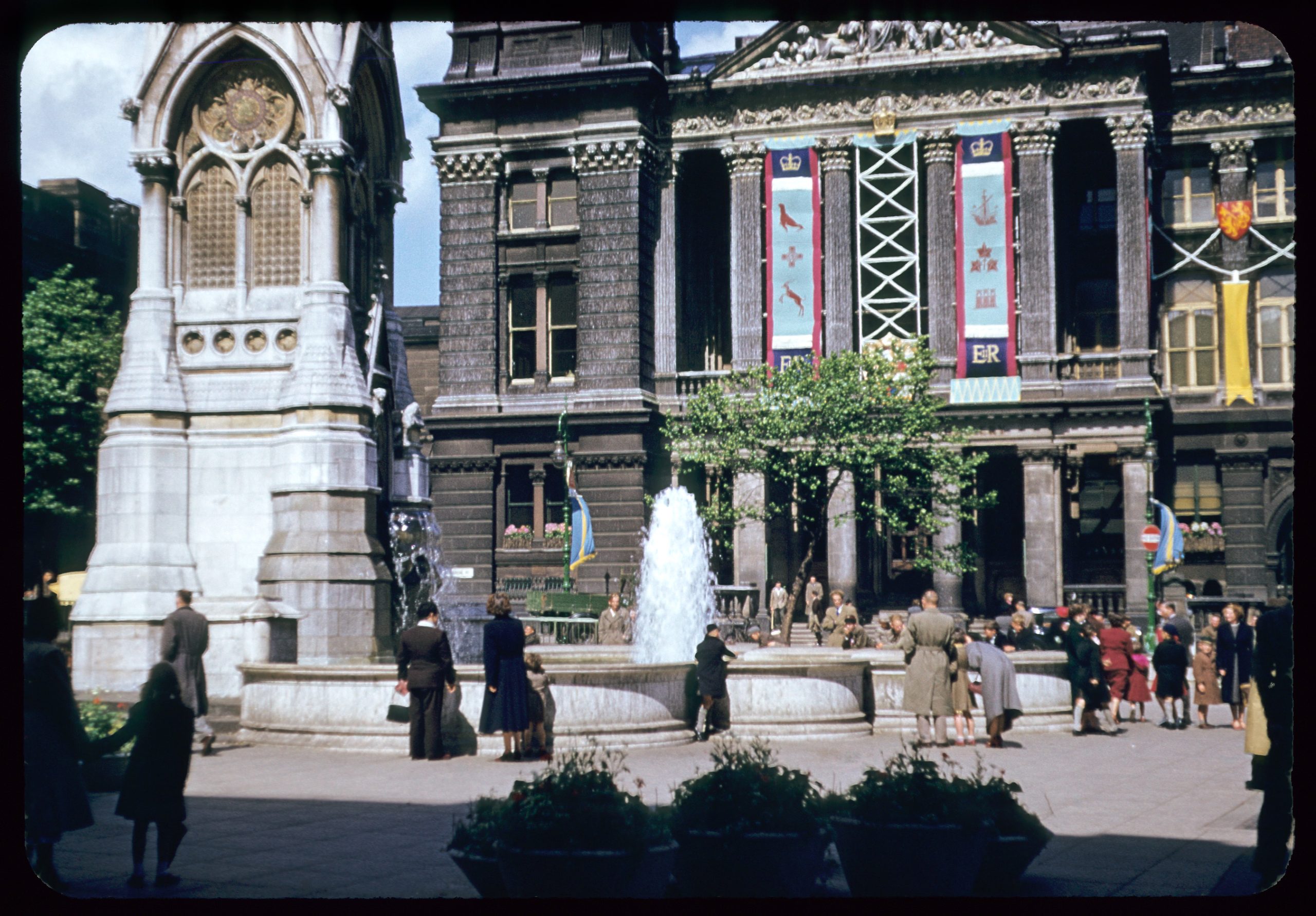 Photograph of the Art Gallery and Chamberlain fountain decorated for the celebrations of the coronation of Queen Elizabeth II. The photograph was taken in mid 1953.